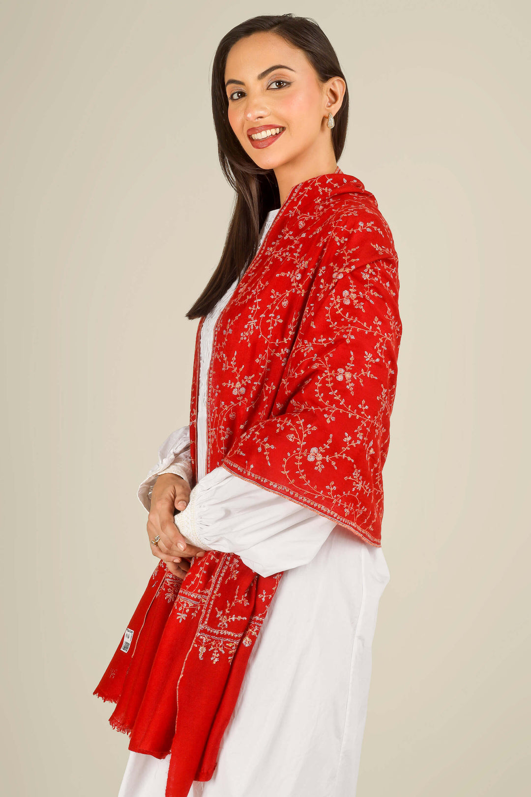GI red Kashmiri pure pashmina embroidered stole by Kepra, worn over white dress, front product image