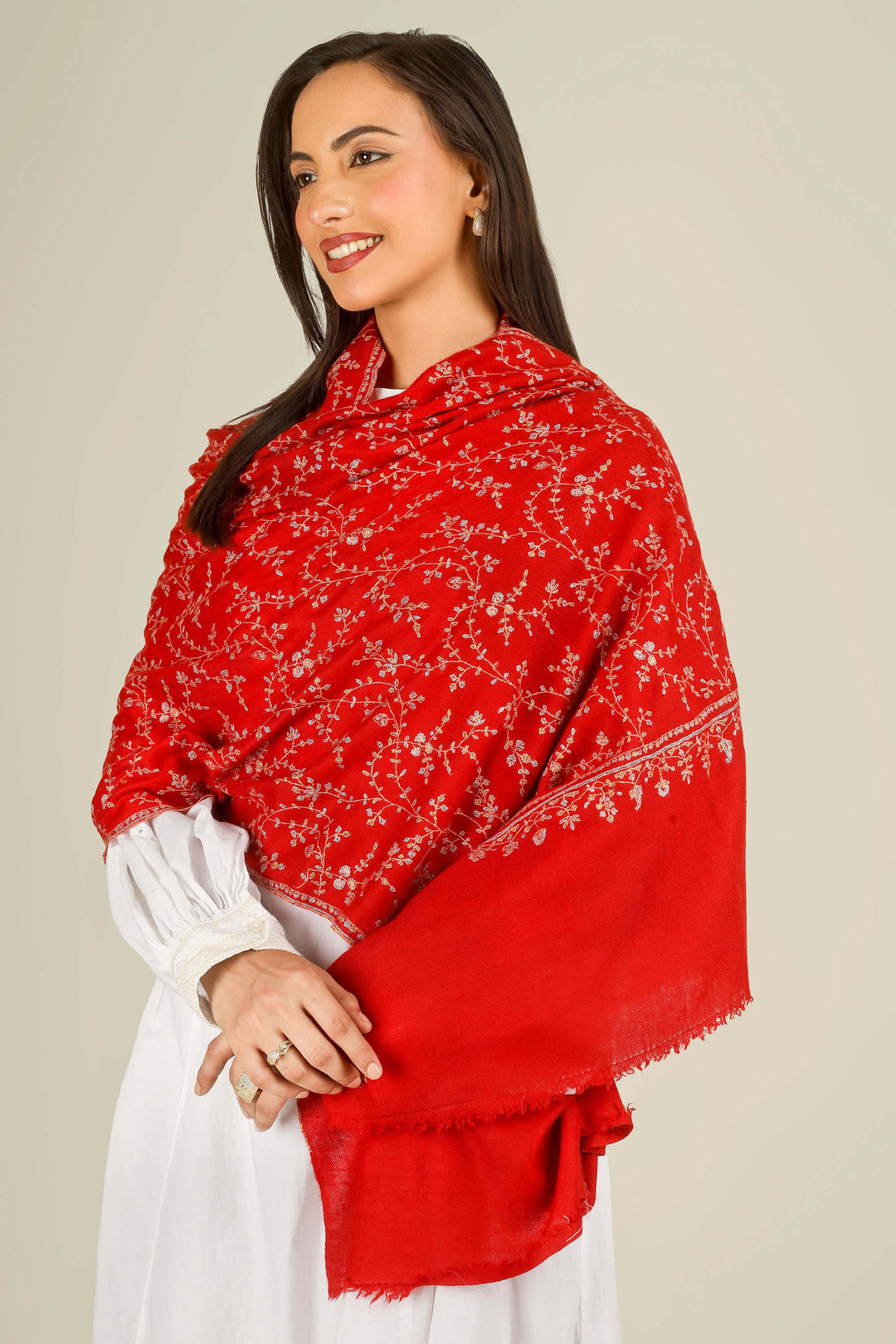 GI red Kashmiri pure pashmina embroidered stole by Kepra, worn over white dress, front product image