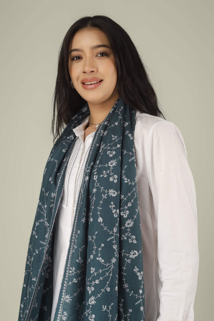 Hand-embroidered teal grey pure Pashmina stole with silver-tone all-over Jaldaar Sozni floral vine embroidery from Kepra
    
      | pashmina shawls online | authentic Kashmiri pashmina shawl online | pure pashmina shawl online | original GI certified pashmina shawl online | luxury men's pashmina shawl online from Kashmir | where to buy online pure pashmina in India
    
    | GI Tag Certified - Government-verified authentic Kashmiri Pashmina
    | G20 Official Partner - Selected by India for G20 Summit gifting
    | Handicraft Registered - Official recognition of traditional craftsmanship
    | Certificate of Authenticity - Every purchase includes GI certification