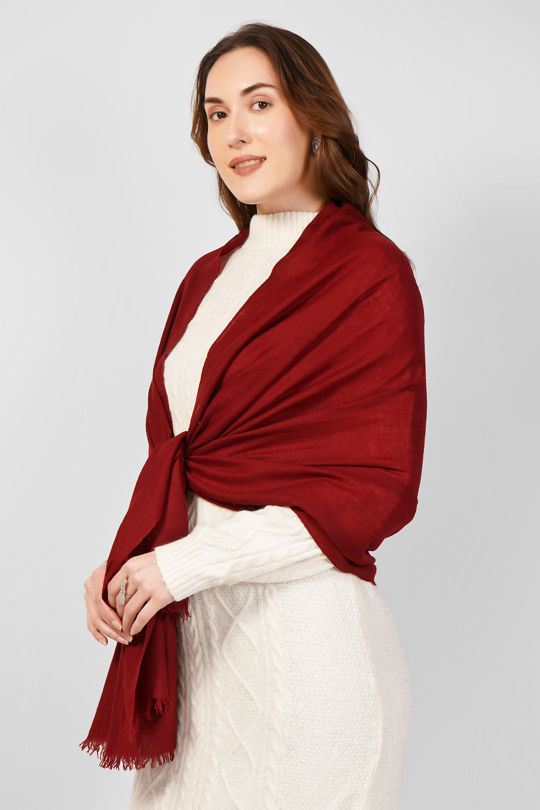 Classic Plain Pashmina Stoles Online – Deep Maroon Sophistication
 Embrace understated elegance with this solid maroon pashmina stole, expertly handloomed in Kashmir from pure, lightweight pashmina wool