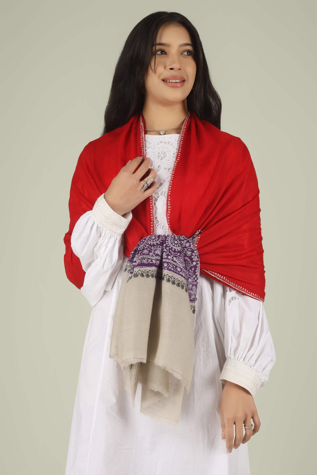 Hand-embroidered ruby red and natural beige dual-tone pure Pashmina stole featuring a broad purple Sozni embroidery band with ivory paisley motifs from Kepra.
