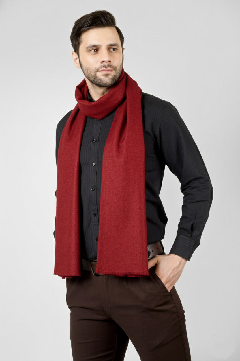 Kashmiri artisans craft this solid red stole in premium pashmina fibres, creating a lightweight neck wrap that adds warmth and striking contrast to business attire, evening looks and winter travel essentials.