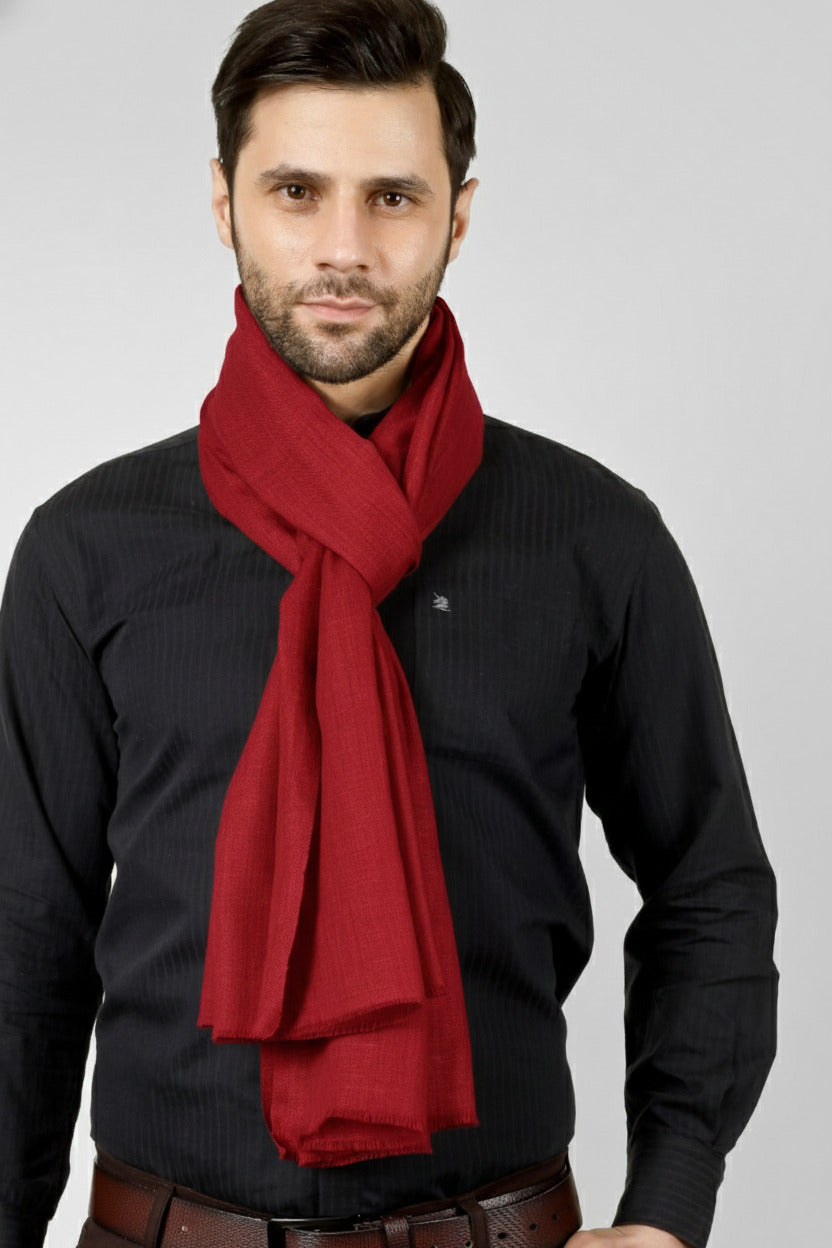 Kashmiri artisans craft this solid red stole in premium pashmina fibres, creating a lightweight neck wrap that adds warmth and striking contrast to business attire, evening looks and winter travel essentials.