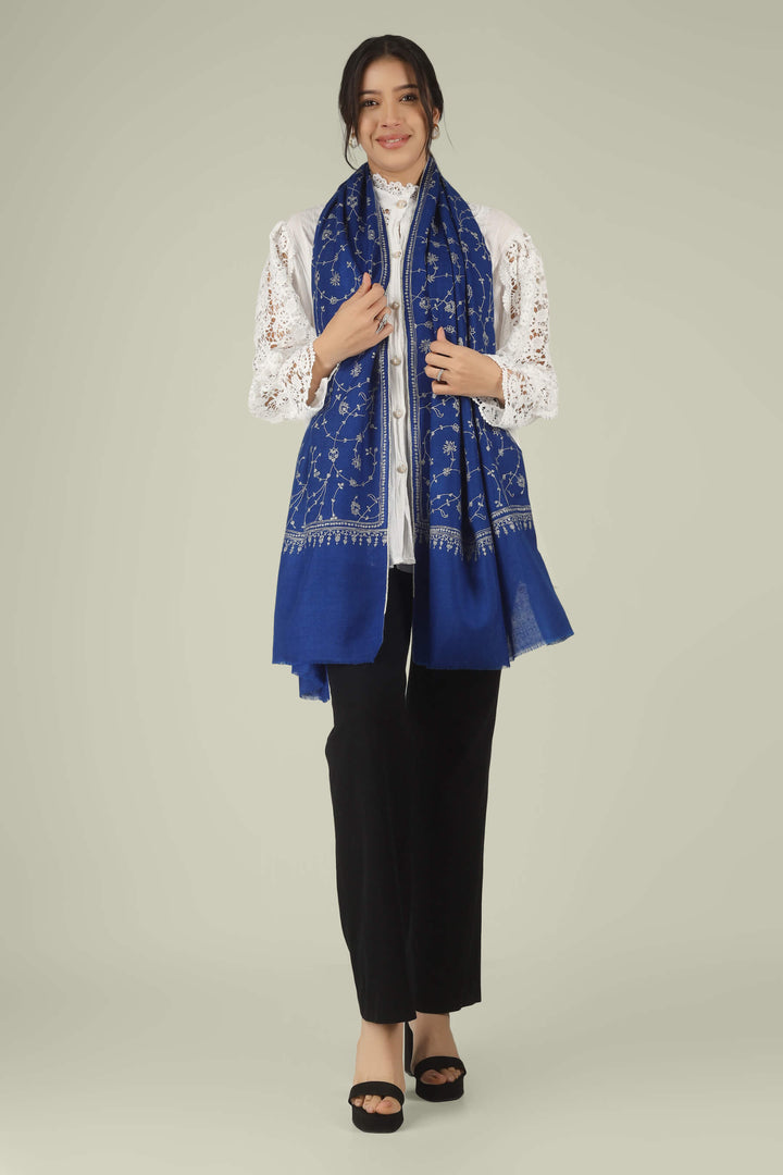 Hand-embroidered royal blue pure Pashmina stole featuring an all-over silver-tone Jaldaar Sozni floral vine pattern from Kepra.
    
      | pashmina shawls online | authentic Kashmiri pashmina shawl online | pure pashmina shawl online | original GI certified pashmina shawl online | luxury men's pashmina shawl online from Kashmir | where to buy online pure pashmina in India
    
    | GI Tag Certified - Government-verified authentic Kashmiri Pashmina
    | G20 Official Partner - Selected by India for G20 Summit gifting
    | Handicraft Registered - Official recognition of traditional craftsmanship
    | Certificate of Authenticity - Every purchase includes GI certification