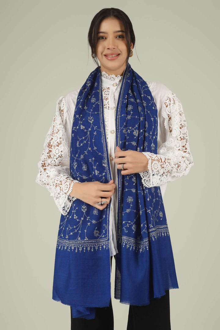 Hand-embroidered royal blue pure Pashmina stole featuring an all-over silver-tone Jaldaar Sozni floral vine pattern from Kepra.
    
      | pashmina shawls online | authentic Kashmiri pashmina shawl online | pure pashmina shawl online | original GI certified pashmina shawl online | luxury men's pashmina shawl online from Kashmir | where to buy online pure pashmina in India
    
    | GI Tag Certified - Government-verified authentic Kashmiri Pashmina
    | G20 Official Partner - Selected by India for G20 Summit gifting
    | Handicraft Registered - Official recognition of traditional craftsmanship
    | Certificate of Authenticity - Every purchase includes GI certification