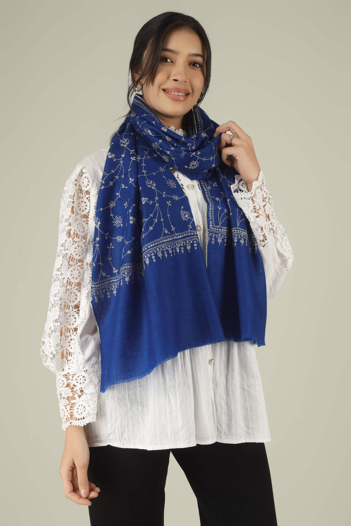 Hand-embroidered royal blue pure Pashmina stole featuring an all-over silver-tone Jaldaar Sozni floral vine pattern from Kepra.
    
      | pashmina shawls online | authentic Kashmiri pashmina shawl online | pure pashmina shawl online | original GI certified pashmina shawl online | luxury men's pashmina shawl online from Kashmir | where to buy online pure pashmina in India
    
    | GI Tag Certified - Government-verified authentic Kashmiri Pashmina
    | G20 Official Partner - Selected by India for G20 Summit gifting
    | Handicraft Registered - Official recognition of traditional craftsmanship
    | Certificate of Authenticity - Every purchase includes GI certification