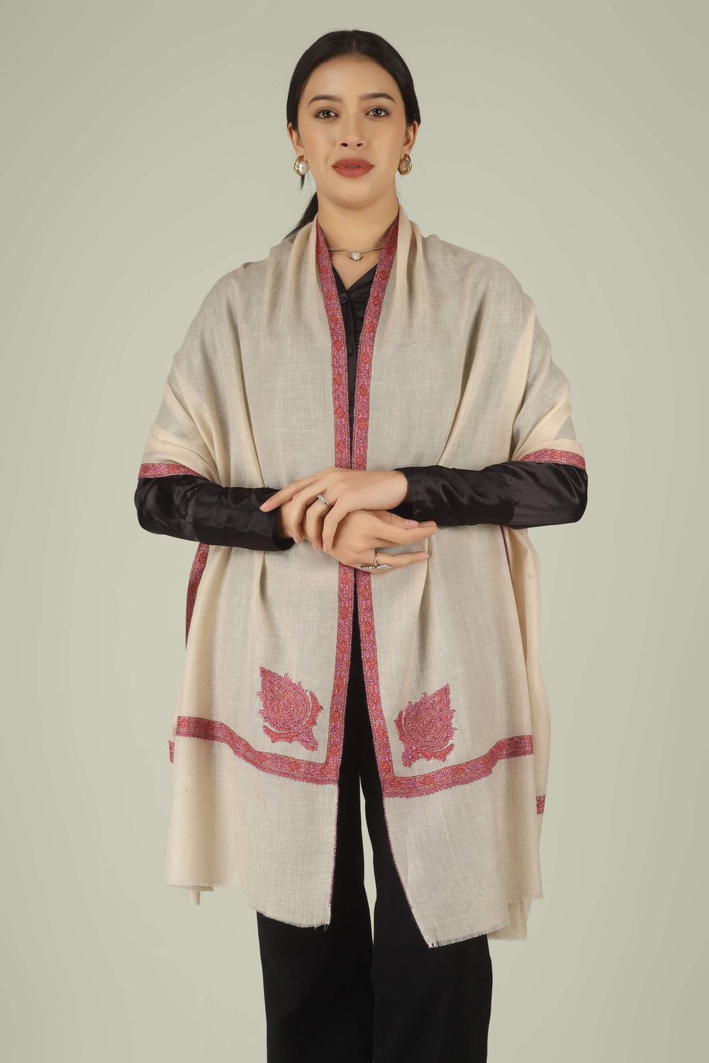 Hand-embroidered off-white pure Pashmina stole featuring pink and rust Sozni paisley (Buta) motifs and a delicate Hashidaar border from Kepra.