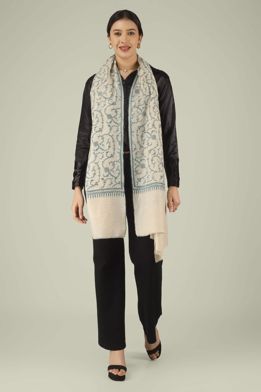 Hand-embroidered ivory off-white pure Pashmina stole featuring an all-over teal Sozni Jaldaar floral vine pattern from Kepra.