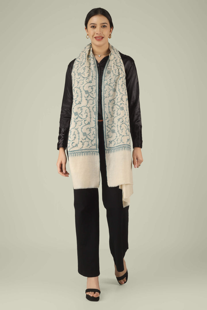 Hand-embroidered ivory off-white pure Pashmina stole featuring an all-over teal Sozni Jaldaar floral vine pattern from Kepra.
    
      | pashmina shawls online | authentic Kashmiri pashmina shawl online | pure pashmina shawl online | original GI certified pashmina shawl online | luxury men's pashmina shawl online from Kashmir | where to buy online pure pashmina in India
    
    | GI Tag Certified - Government-verified authentic Kashmiri Pashmina
    | G20 Official Partner - Selected by India for G20 Summit gifting
    | Handicraft Registered - Official recognition of traditional craftsmanship
    | Certificate of Authenticity - Every purchase includes GI certification