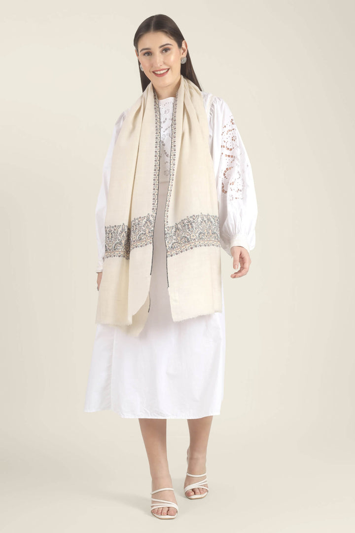 Model wearing a white GI Kashmiri Pure Pashmina stole with multicolour floral Sozni embroidered borders over a white outfit.
    
      | pashmina shawls online | authentic Kashmiri pashmina shawl online | pure pashmina shawl online | original GI certified pashmina shawl online | luxury men's pashmina shawl online from Kashmir | where to buy online pure pashmina in India
    
    | GI Tag Certified - Government-verified authentic Kashmiri Pashmina
    | G20 Official Partner - Selected by India for G20 Summit gifting
    | Handicraft Registered - Official recognition of traditional craftsmanship
    | Certificate of Authenticity - Every purchase includes GI certification