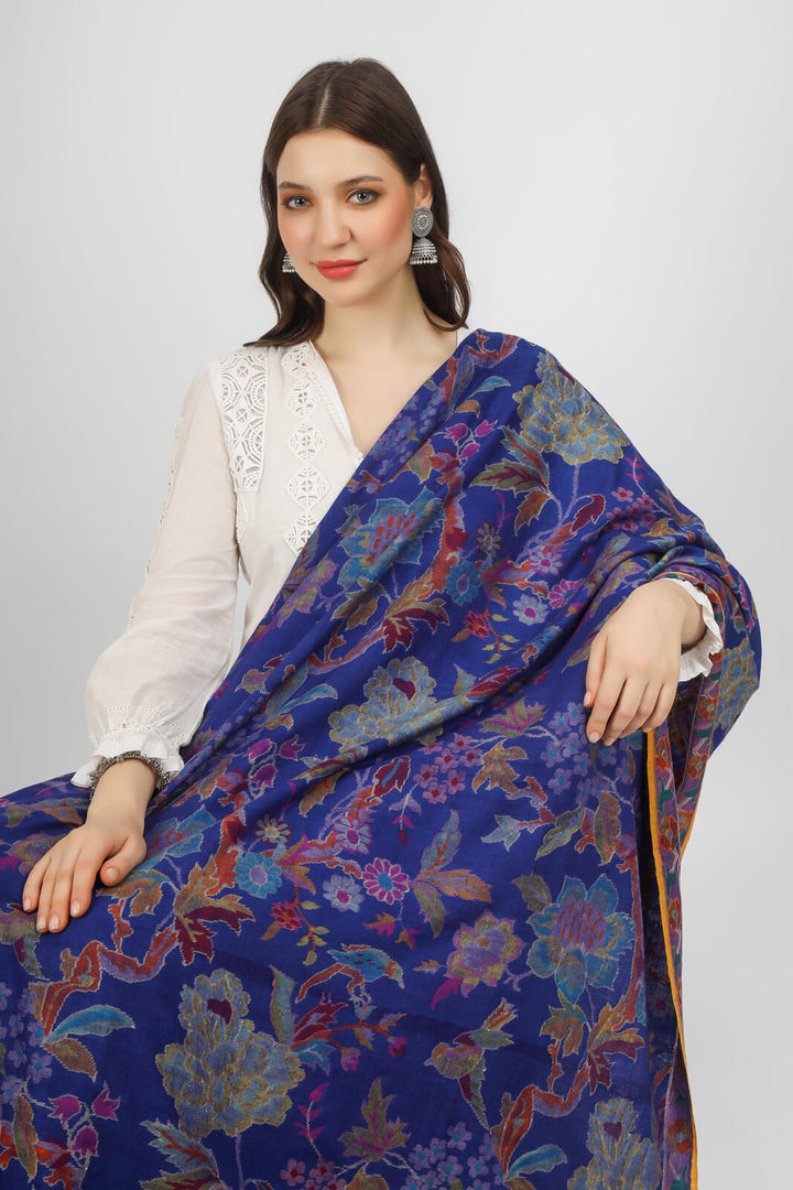 KANI SHAWLS - "This stunning royal blue Kani shawl features a big floral design that is both intricate and eye-catching. Expertly crafted by skilled artisans".you can order from DELHI, DUBAI, LONDON .