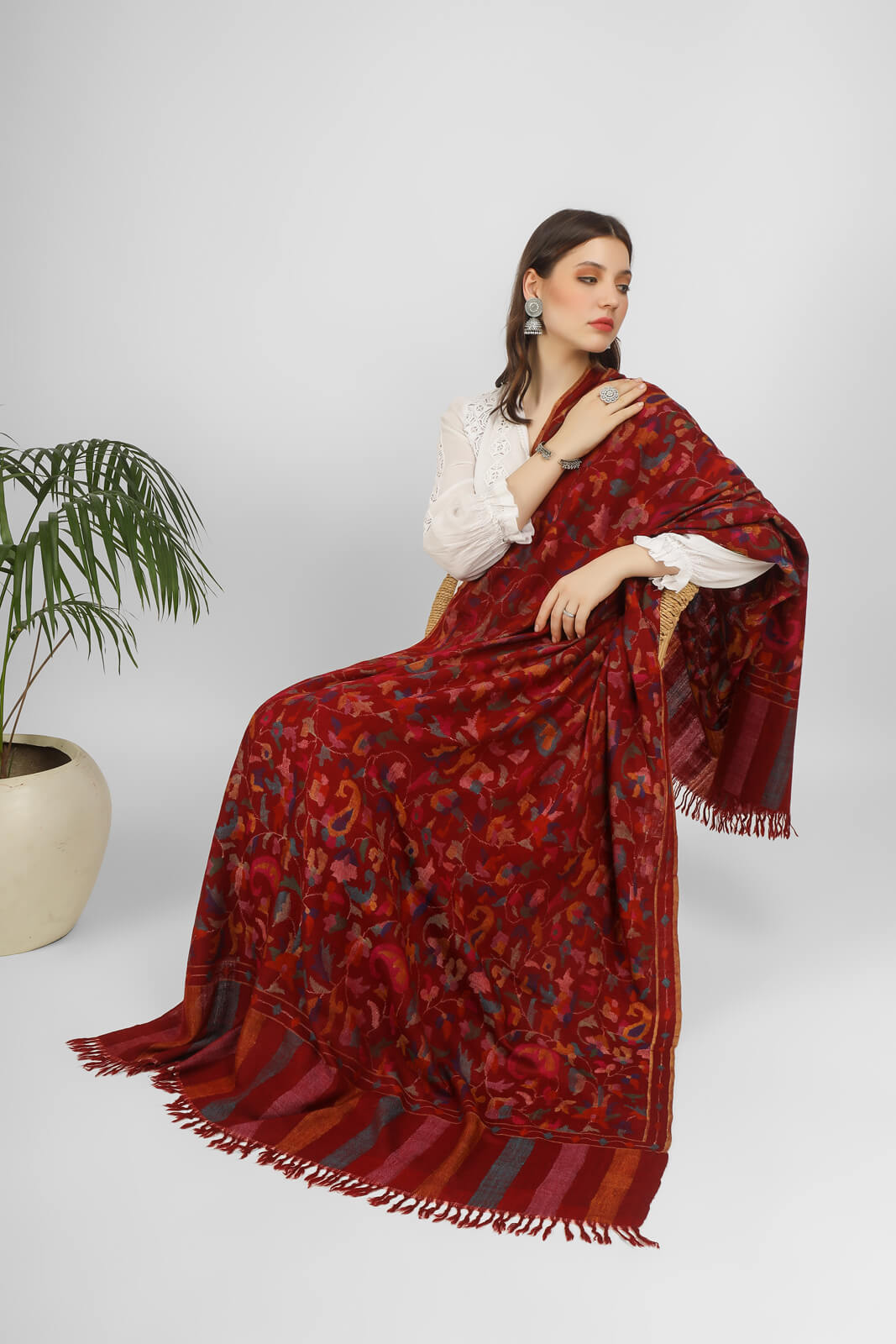 "KANI SHAWLS - Explore the Elegance of Maroon Kani Shawl, Skillfully Woven Florals and Nature's Colors in Splendid Kani Weave." LONDON - DELHI- KASHMIR - ONLINE