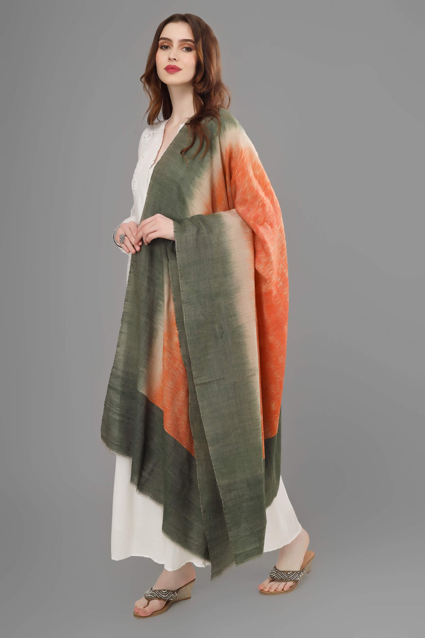 This luxurious, authentic and handmade Pashmina Stole, designed in a Dubai Ikkat pattern, is crafted by the most talented and skilled Artisans. 