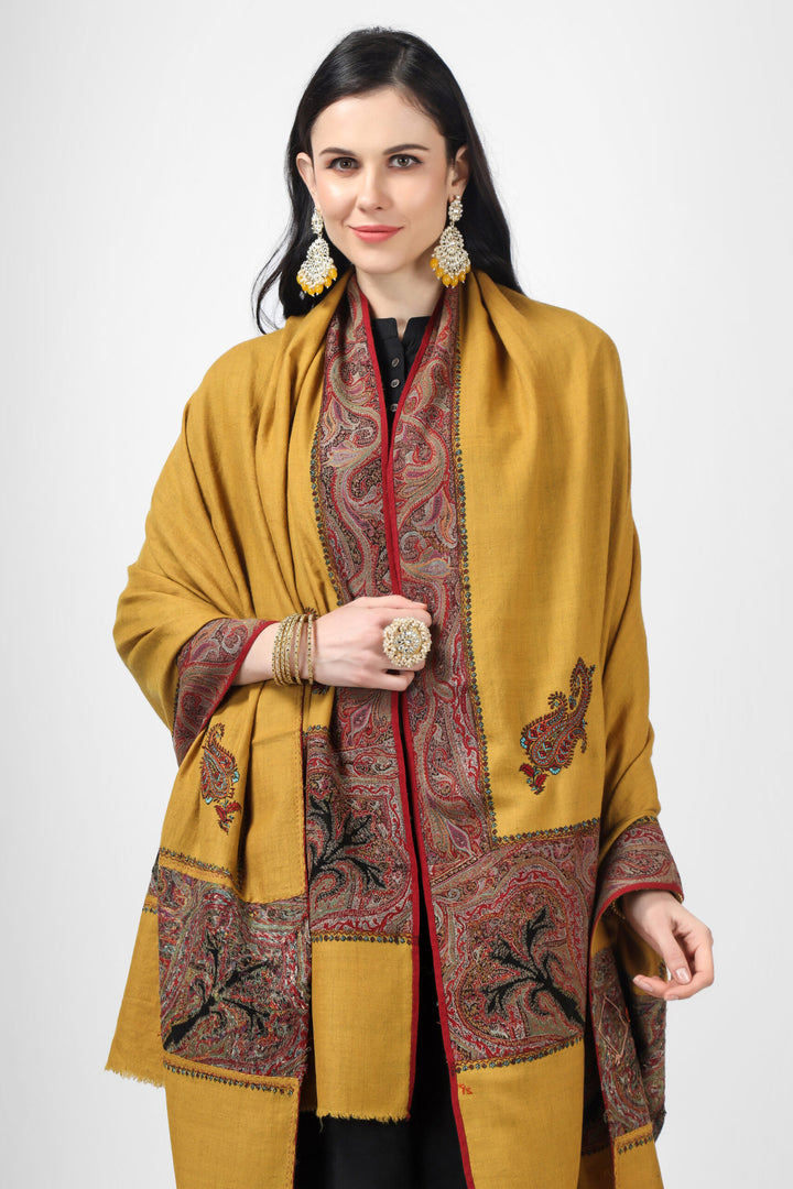 Pashmina shawl from the 19th century with a classic pattern. This mustard shawl has a needlework almond-shaped border and an old jamawar border. The original and authentic pashmina shawl from Kashmir. Resources and Methods, Hand-woven Pashmina Wool Origin India Kashmir Era 19th Century Date of Production Around 1850
    
      | pashmina shawls online | authentic Kashmiri pashmina shawl online | pure pashmina shawl online | original GI certified pashmina shawl online | luxury men's pashmina shawl online from Kashmir | where to buy online pure pashmina in India
    
    | GI Tag Certified - Government-verified authentic Kashmiri Pashmina
    | G20 Official Partner - Selected by India for G20 Summit gifting
    | Handicraft Registered - Official recognition of traditional craftsmanship
    | Certificate of Authenticity - Every purchase includes GI certification