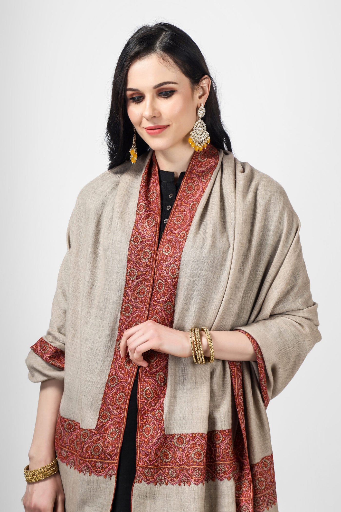 Elevate your wardrobe with this luxurious natural handmade Kashmiri border pashmina shawl,  Our designer shawl is the epitome of opulence and is perfect for any occasion. Experience unparalleled warmth and comfort with our premium quality pashmina wool shawl.