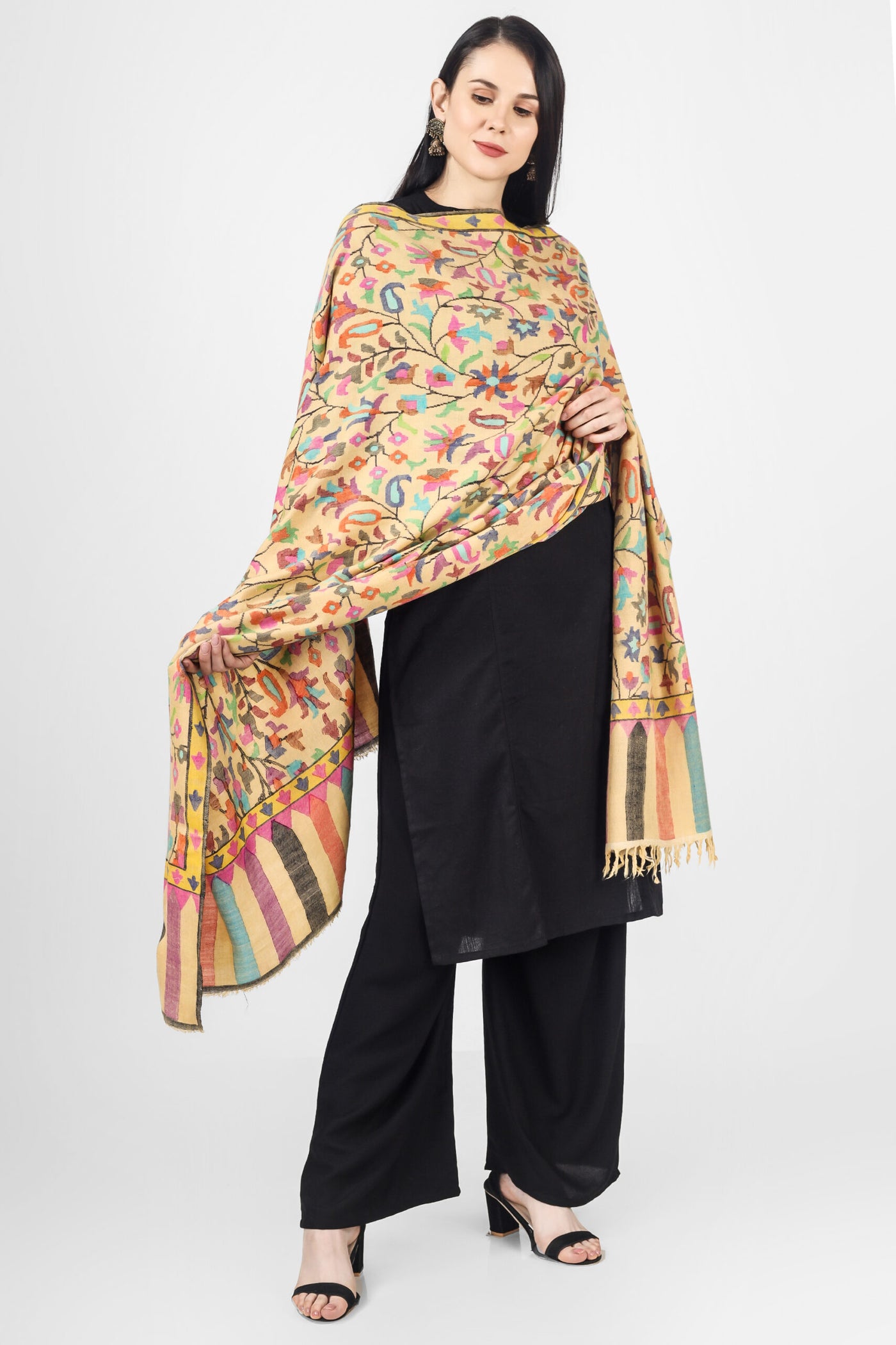 The blooming almond blossoms direct from the alcoves and gardens of Kashmir are elegantly hand-woven onto a luxurious, soft and warm yellow Pashmina Shawl,
