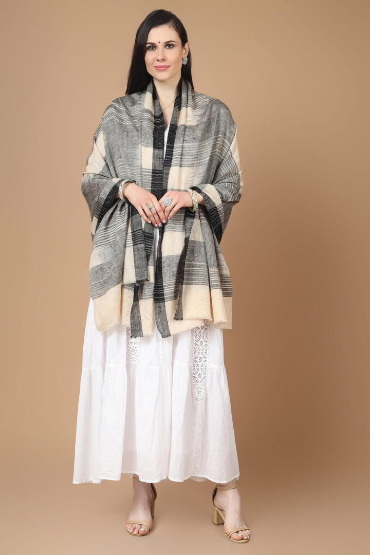 This luxurious, authentic and handmade Pashmina Stole, designed in a Kuwait Ikkat pattern, is crafted by the most talented and skilled Kashmiri Artisans. 