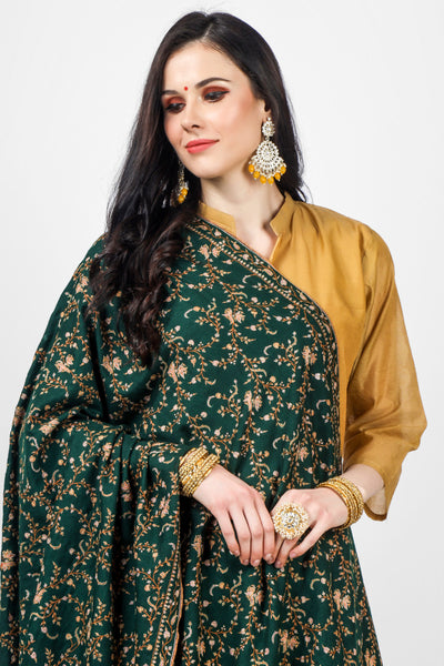 KUWAIT -  Overall, the Lotus Green Pashmina Jaldaar Sozni Embroidered Shawl is a beautiful and luxurious piece that can be worn for special occasions or used as a statement piece to elevate any outfit. It also makes for a thoughtful and meaningful gift for a loved one.