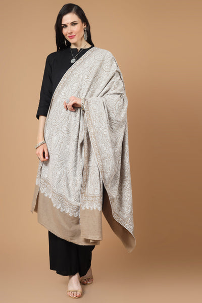  the garment of praise, a versatile piece of art with alluring Sozni embroidery. This natural (khudrang) Pure Pashmina Shawl with white Sozni Jama Hand-Embroidery