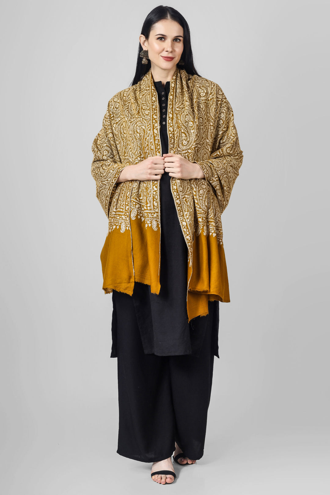 A beautiful bright Mustard (golden)colored Pashmina jama  is featured by intricate Sozni across its surface called the Jama pattern . 