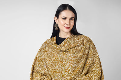 A beautiful bright Mustard (golden)colored Pashmina jama  is featured by intricate Sozni across its surface called the Jama pattern . 