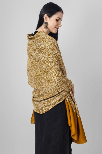 A beautiful bright Mustard (golden)colored Pashmina jama  is featured by intricate Sozni across its surface called the Jama pattern . 