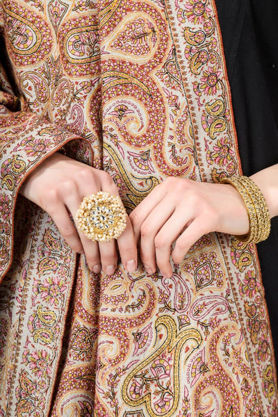  A beautiful Natural Pashmina color is featured by intricate Sozni across its surface called the Jamawaar pattern (jama shawl)giving it a contemporary edge. 
