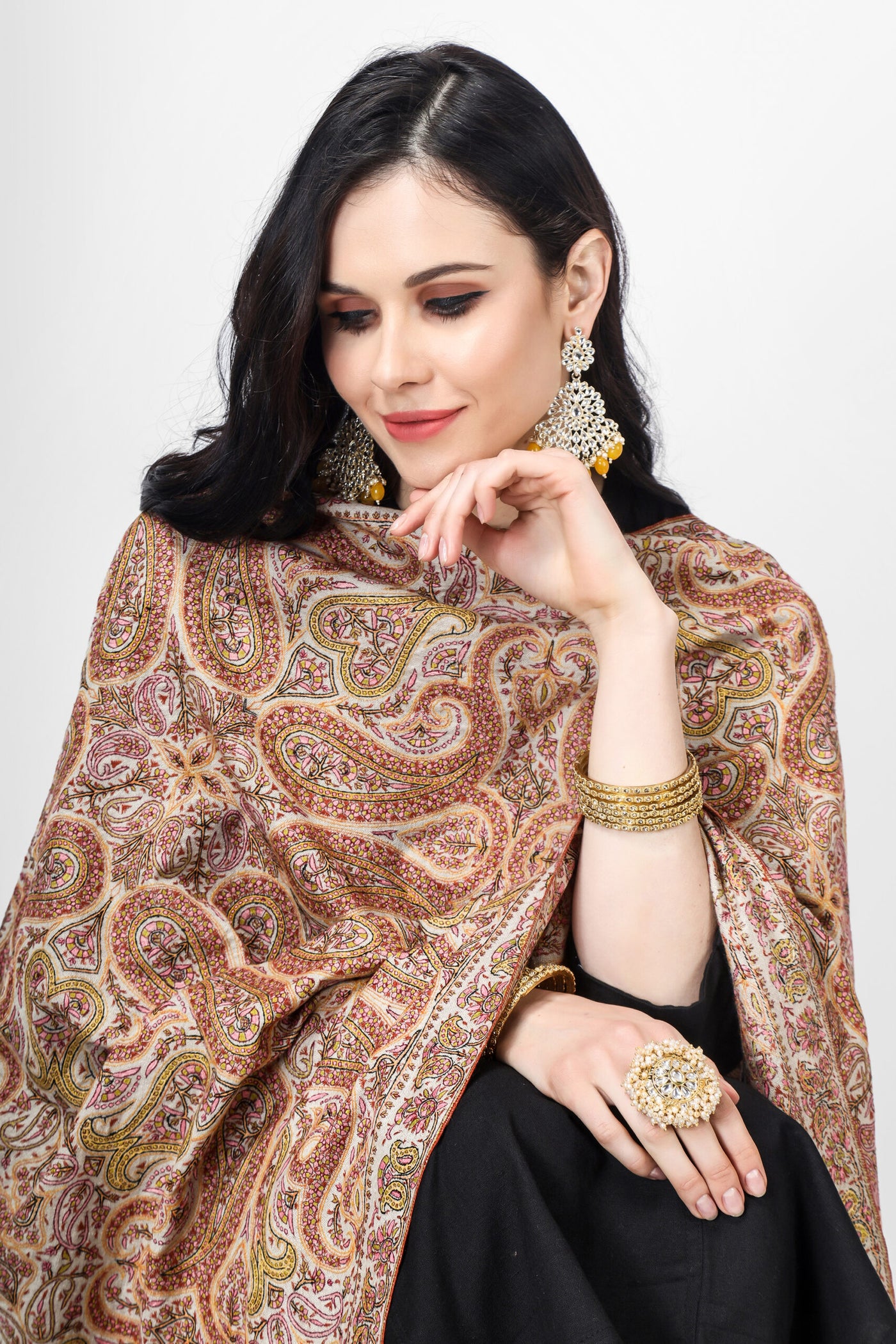  A beautiful Natural Pashmina color is featured by intricate Sozni across its surface called the Jamawaar pattern (jama shawl)giving it a contemporary edge. 