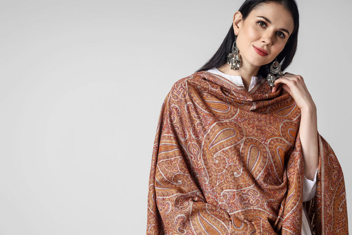 This natural (khud-rang) Pure Pashmina Shawl with Sozni Jama Hand-Embroidery will embrace your beauty in every way,