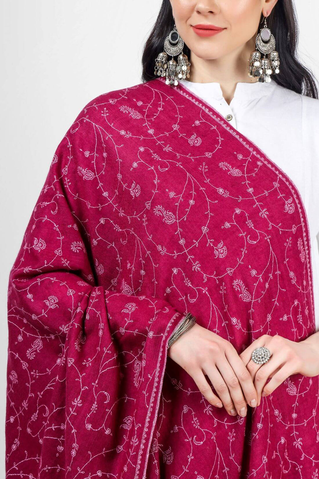 PASHMINA SHAWLS - A Plum Velvet Pink Pashmina Jaldaar Embroidered Shawl is a luxurious and elegant shawl made from high-quality pashmina wool. The shawl is designed with a unique Jaldaar pattern that features intricate weaving and embroidery with fine silk threads.