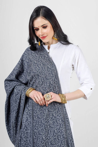 PASHMINA SHAWLS -  This Gray pashmina shawl Jaldaar can be draped over the shoulders to add a touch of elegance to any outfit. It can also be worn as a hijab or headscarf for a modest and stylish look. The intricate embroidery and unique pattern make this shawl a truly one-of-a-kind piece that is sure to impress.