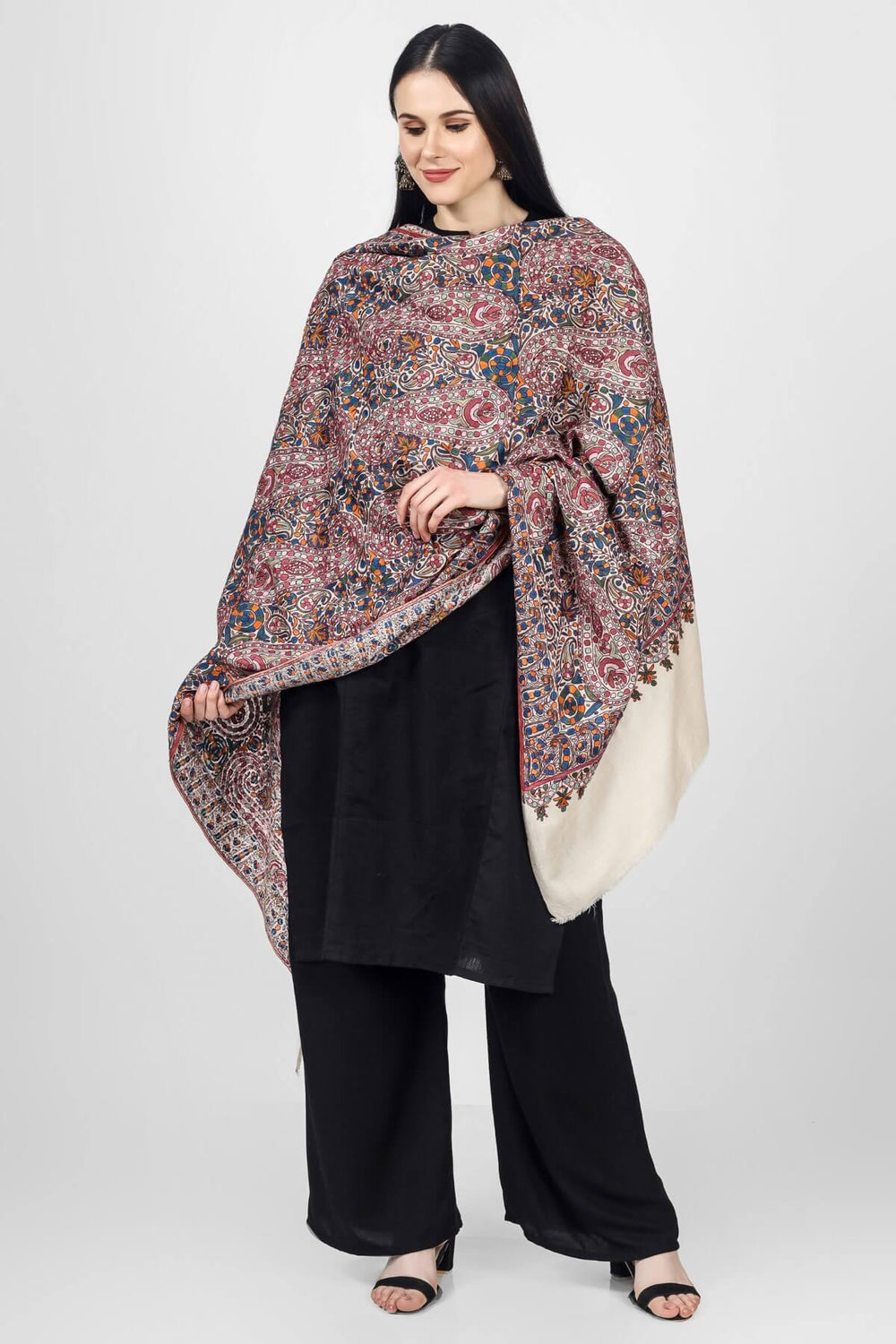 This White  Pure Pashmina Shawl With Papier Mache Jama Hand Embroidery inspired by paisley and floral motifs will embrace your beauty in every way.