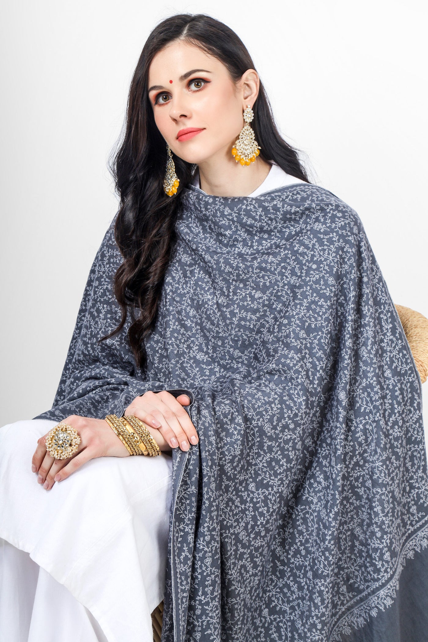 DUBAI  This Gray pashmina shawl Jaldaar can be draped over the shoulders to add a touch of elegance to any outfit. It can also be worn as a hijab or headscarf for a modest and stylish look. The intricate embroidery and unique pattern make this shawl a truly one-of-a-kind piece that is sure to impress.