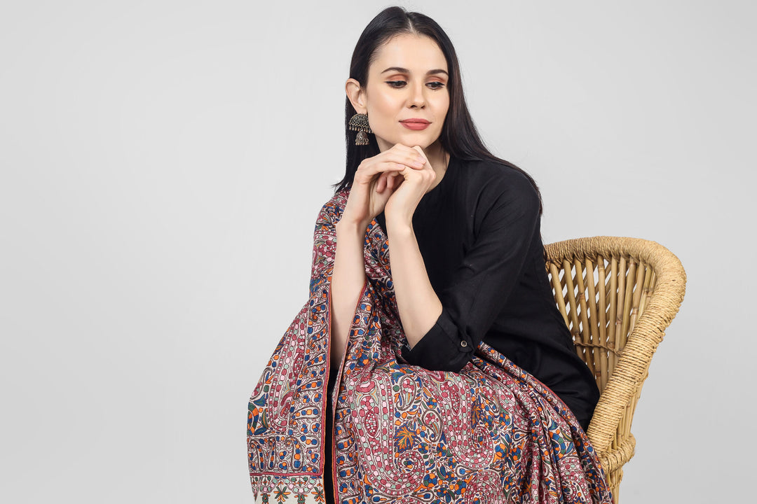 This White  Pure Pashmina Shawl With Papier Mache Jama Hand Embroidery inspired by paisley and floral motifs will embrace your beauty in every way.