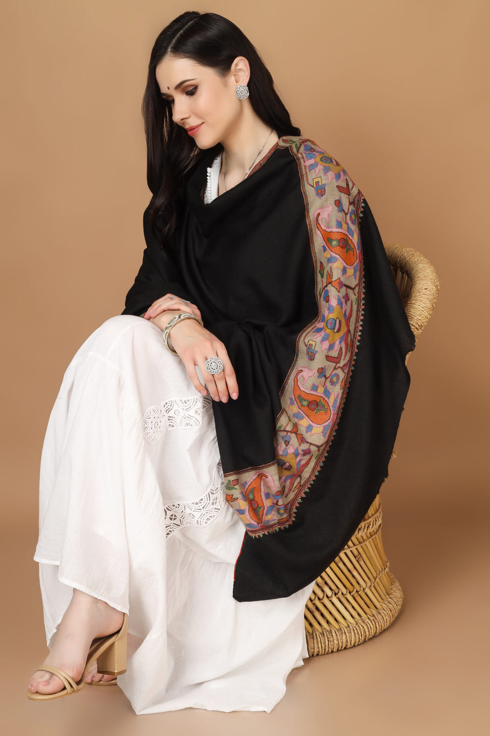 "KANI SHAWL - Black Kani Crafted in Flower Designs on the Pallas in All the Ravishing Colors of Nature is a Treasure Available Online at - CANADA - BRAZIL - GERMANY - SINGAPORE - NORWAY - INDIA - UK - AUSTRALIA - FRANCE - ITALY."