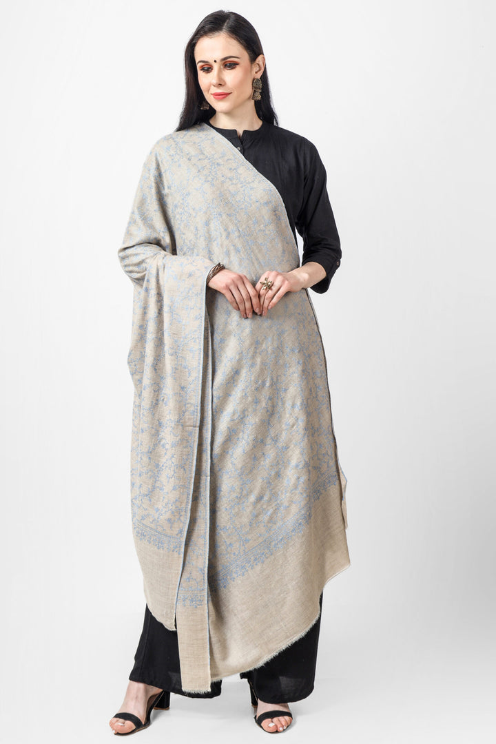  Natural Pashmina Jaldaar light blue embroidered shawl is a type of shawl made from the finest quality of natural Pashmina wool, which comes from the Himalayan mountain range. The wool is known for its softness, warmth, and durability, making it an ideal material for making shawls. 