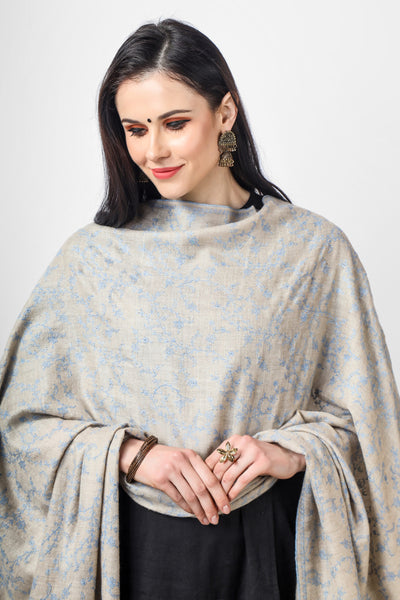  Natural Pashmina Jaldaar light blue embroidered shawl is a type of shawl made from the finest quality of natural Pashmina wool, which comes from the Himalayan mountain range. The wool is known for its softness, warmth, and durability, making it an ideal material for making shawls. 