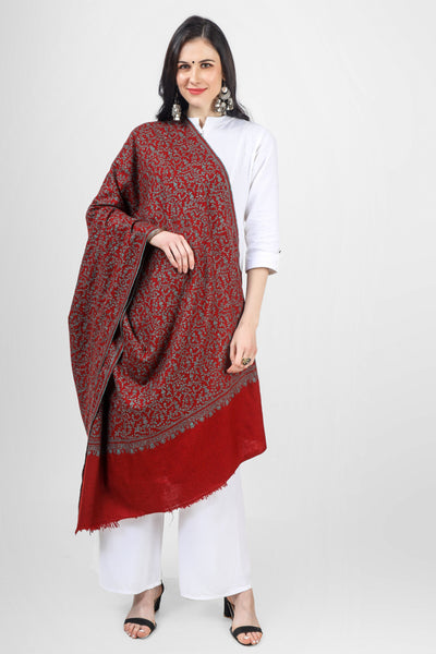 The Maroon Jaldaar Sozni Embroidered Pashmina Shawl is a stunning accessory made from high-quality pashmina wool. 