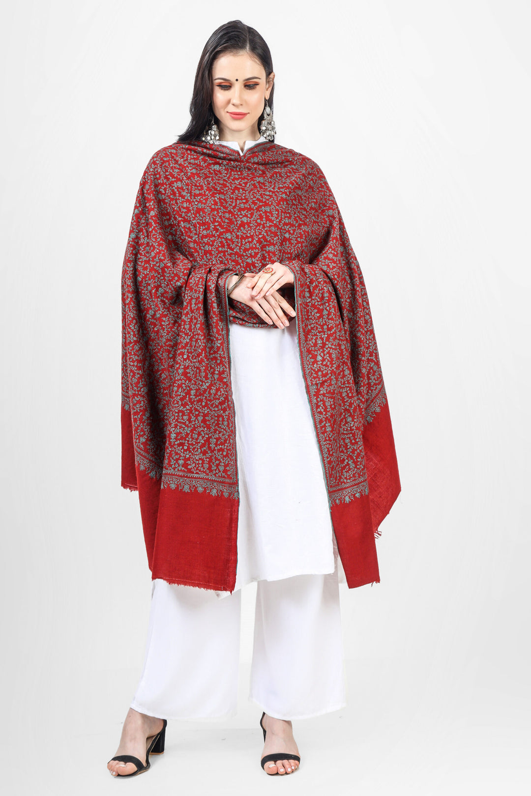 The Maroon Jaldaar Sozni Embroidered Pashmina Shawl is a stunning accessory made from high-quality pashmina wool. 