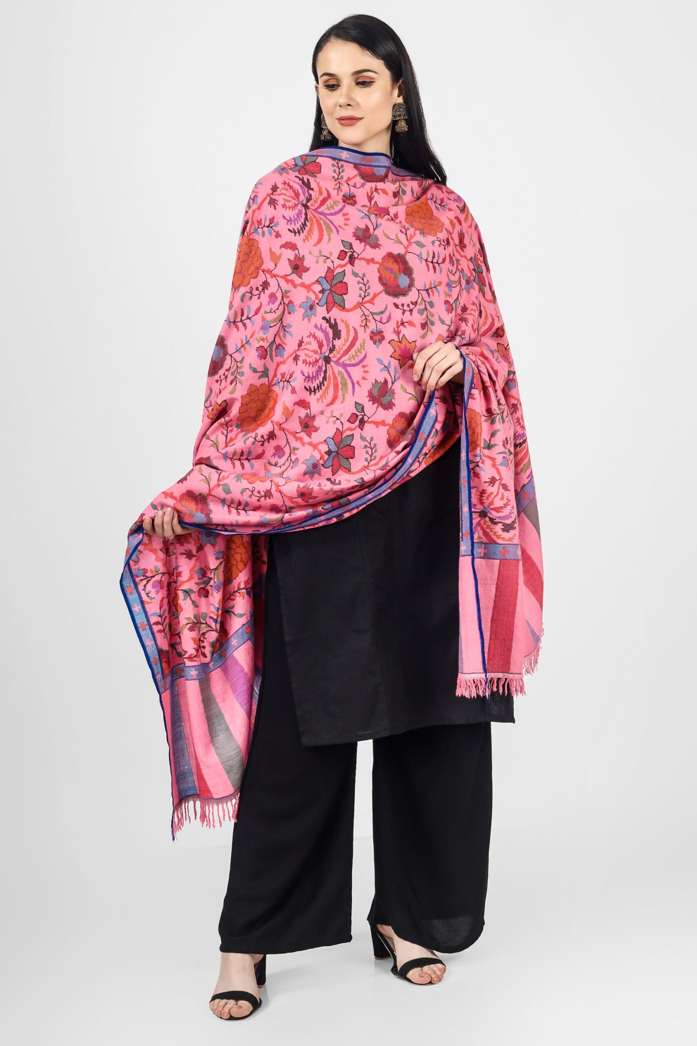 The blooming almond blossoms direct from the alcoves and gardens of Kashmir are directly designed on a pink Pashmina Shawl in Kani pattern.