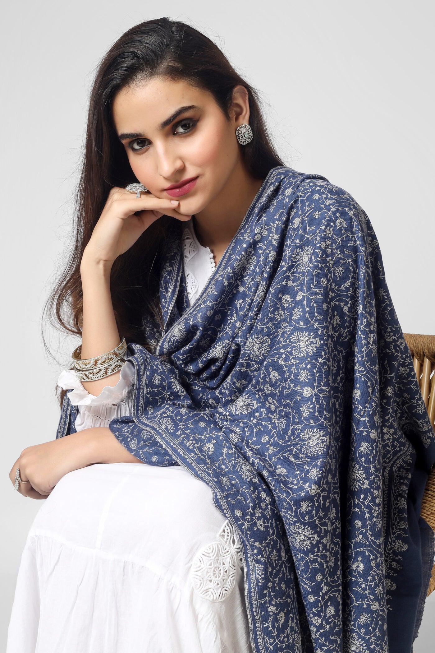 PASHMINA SHAWLS-  This gorgeous Light Purple Blue Pashmina Shawl, which has the renowned Sozni Embroidery in an intricate Jaldaar pattern, is the result of passion and dedication. the item has a magnificent and one-of-a-kind appearance. A collection of this elegant shawl is essential for any fashion enthusiast.
