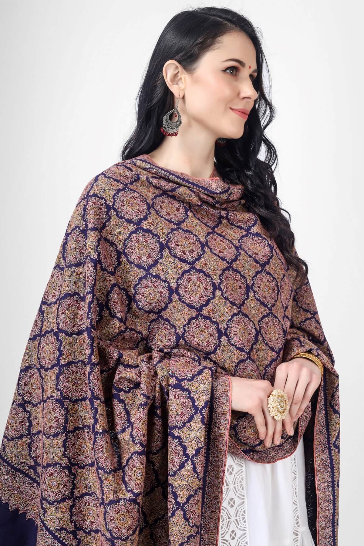 A Royal Blue Pashmina Sozni Jama Reshimkar Shawl is a luxurious handwoven shawl made from high-quality Pashmina fabric 