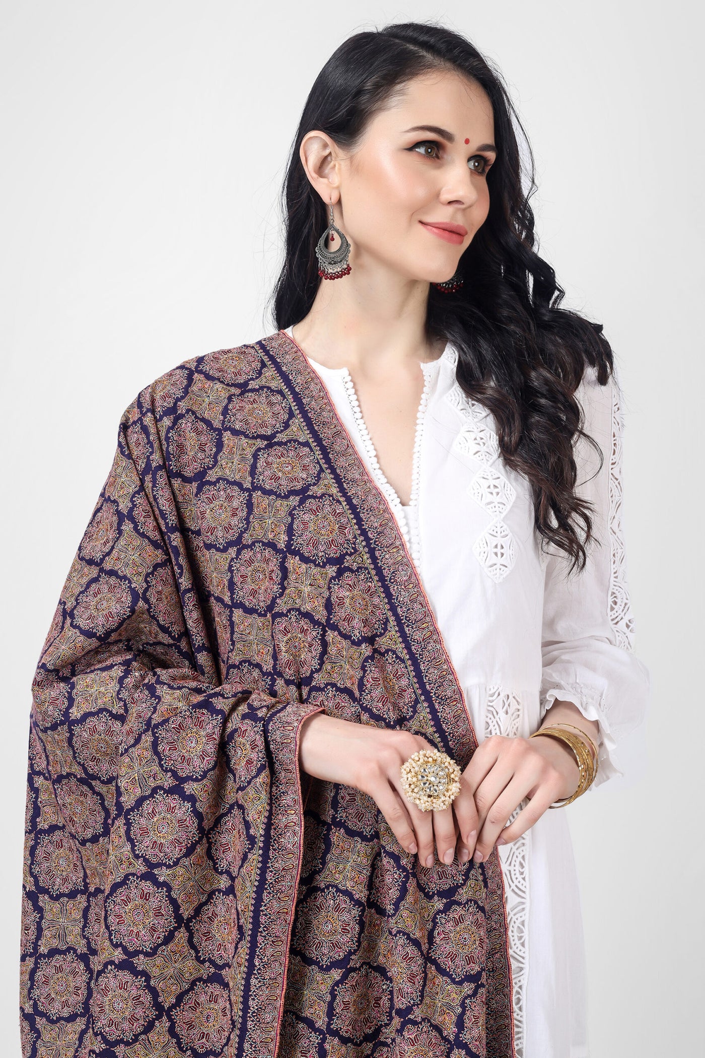 A Royal Blue Pashmina Sozni Jama Reshimkar Shawl is a luxurious handwoven shawl made from high-quality Pashmina fabric 