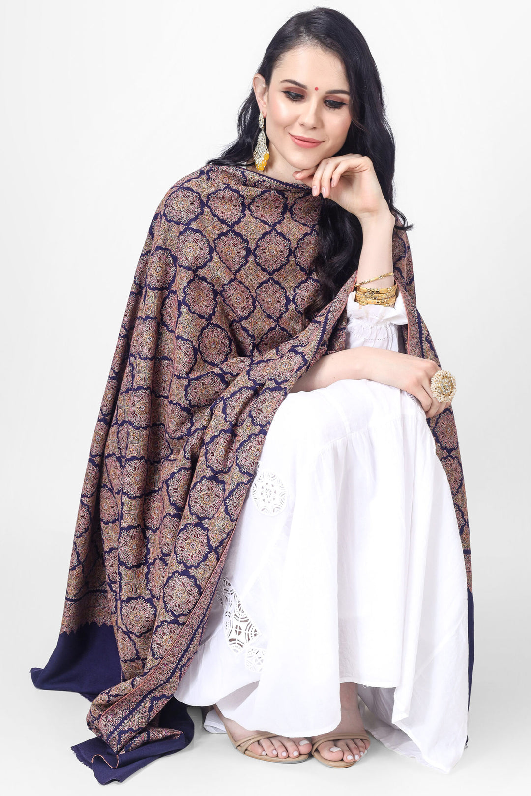 A Royal Blue Pashmina Sozni Jama Reshimkar Shawl is a luxurious handwoven shawl made from high-quality Pashmina fabric 