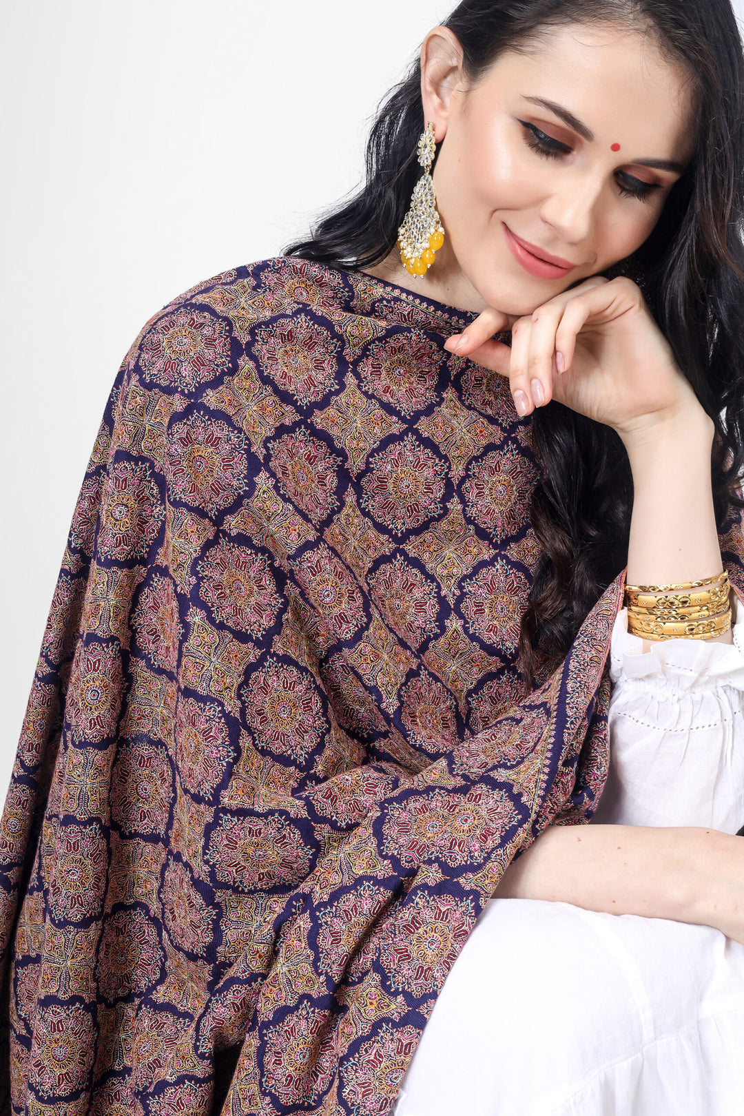 A Royal Blue Pashmina Sozni Jama Reshimkar Shawl is a luxurious handwoven shawl made from high-quality Pashmina fabric 