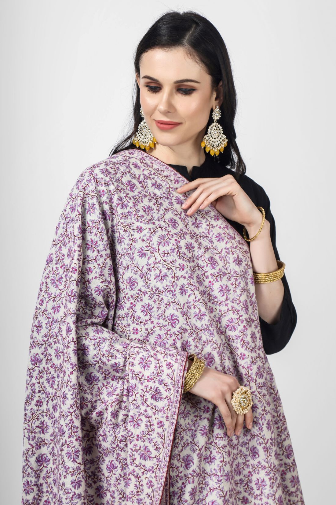 Pashmina shawls - This luxurious White Pashmina Jaldaar With Purple needlework Embroidered Shawl is adorned with intricate needlework embroidery in a stunning Jaldaar pattern, making it an exquisite and glamorous accessory for any occasion. The premium quality Pashmina wool adds warmth and comfort to the shawl.