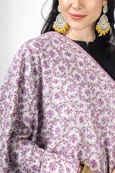 PURE PASHMINA- This luxurious White Pashmina Jaldaar With Purple needlework Embroidered Shawl is adorned with intricate needlework embroidery in a stunning Jaldaar pattern, making it an exquisite and glamorous accessory for any occasion. The premium quality Pashmina wool adds warmth and comfort to the shawl.