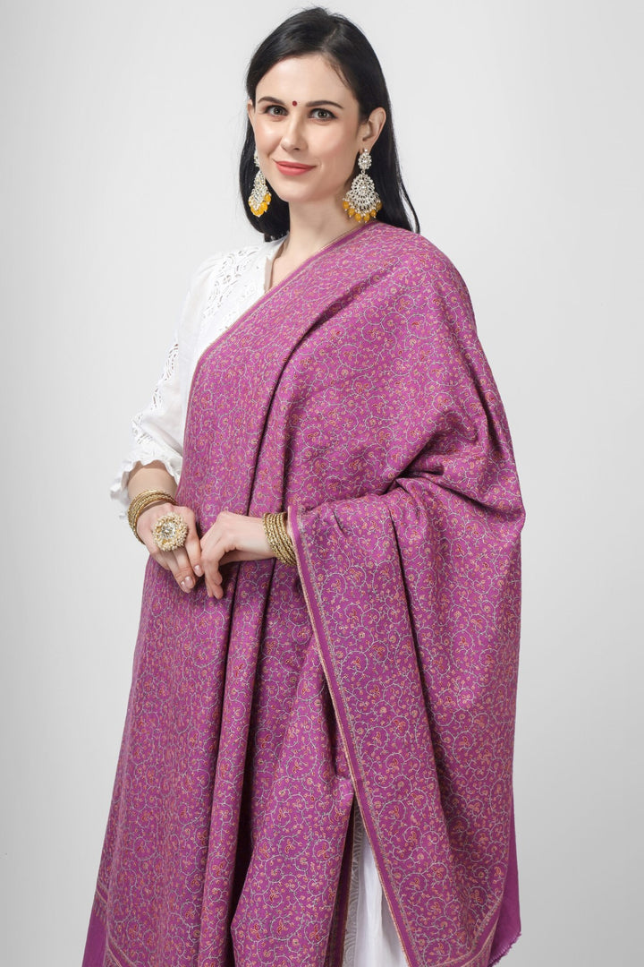 KUWAIT - This elegant White Pashmina Jaldaar With Fuchsia pink needlepoint Embroidered Shawl is decorated with deft needlework embroidery in a gorgeous Jaldaar pattern, making it a sumptuous and fashionable addition to any event.