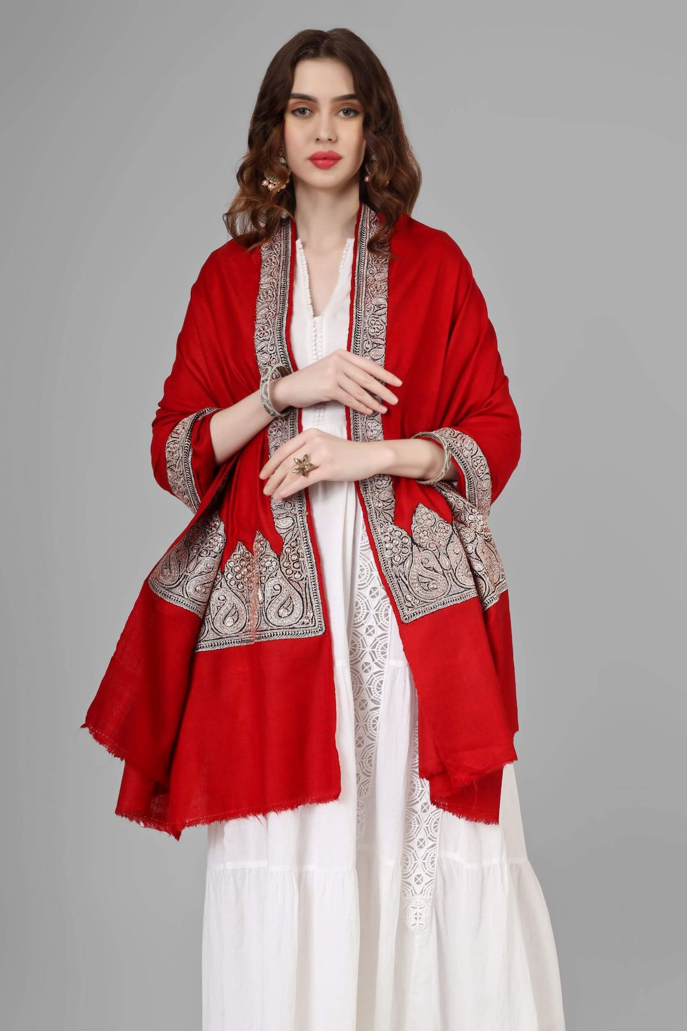  In conclusion, if you want to indulge in timeless elegance and luxury, a handmade Kashmiri pashmina shawl is the perfect accessory for you. With these intricate embroidery designs, the red tilla traditional design. Visit our pashmina store today to browse our selection and find the perfect shawl for you.